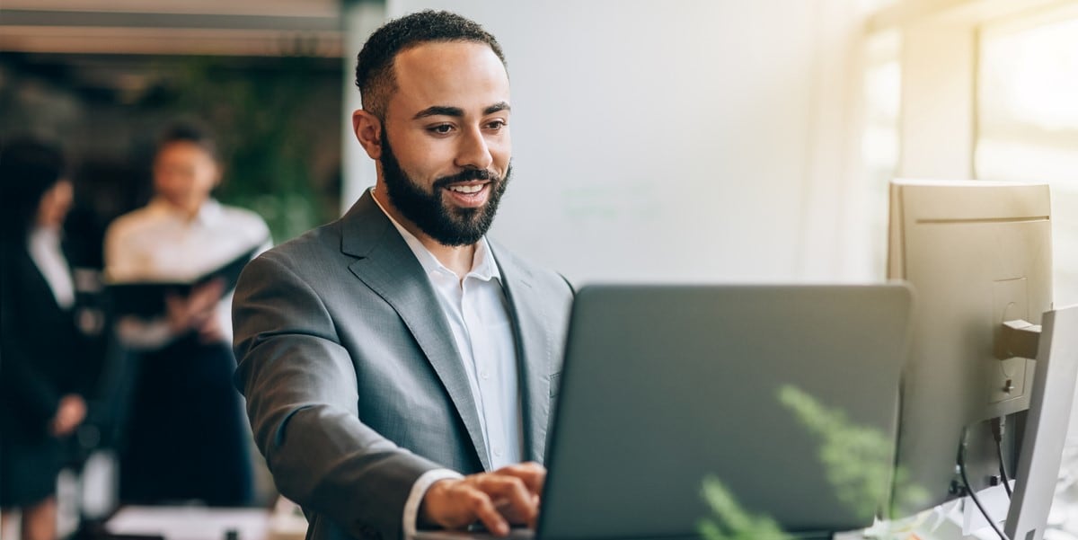 man working at office desk