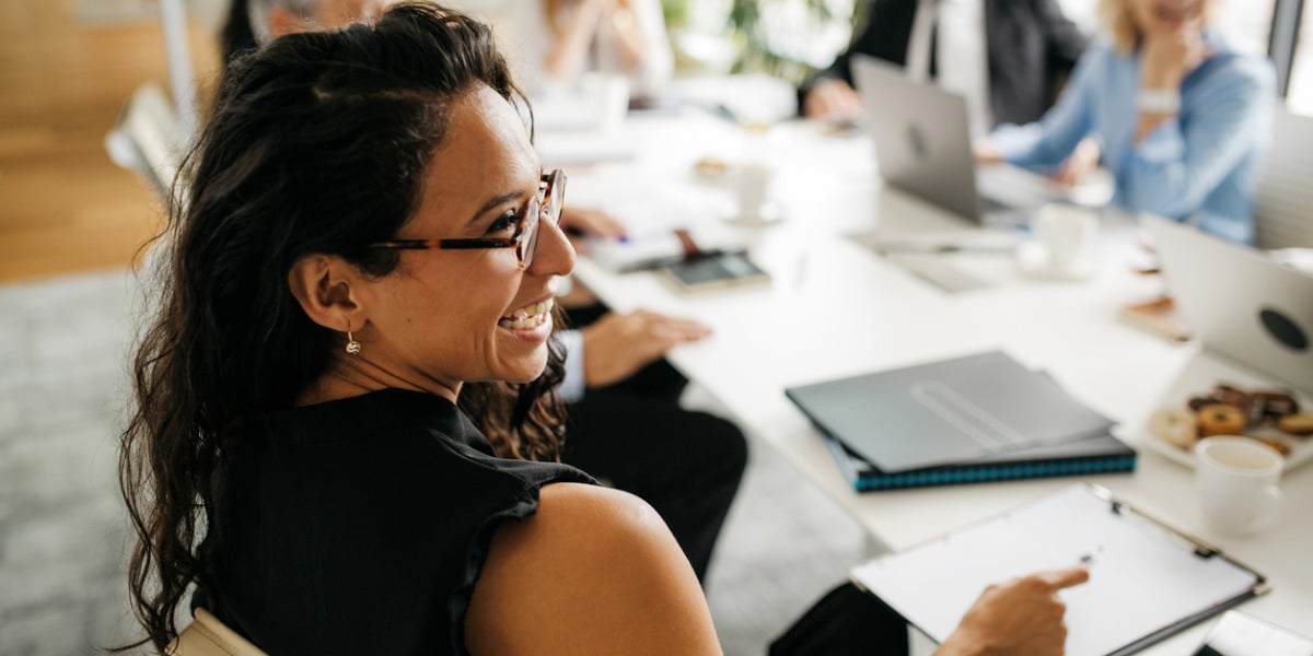 woman in office with team