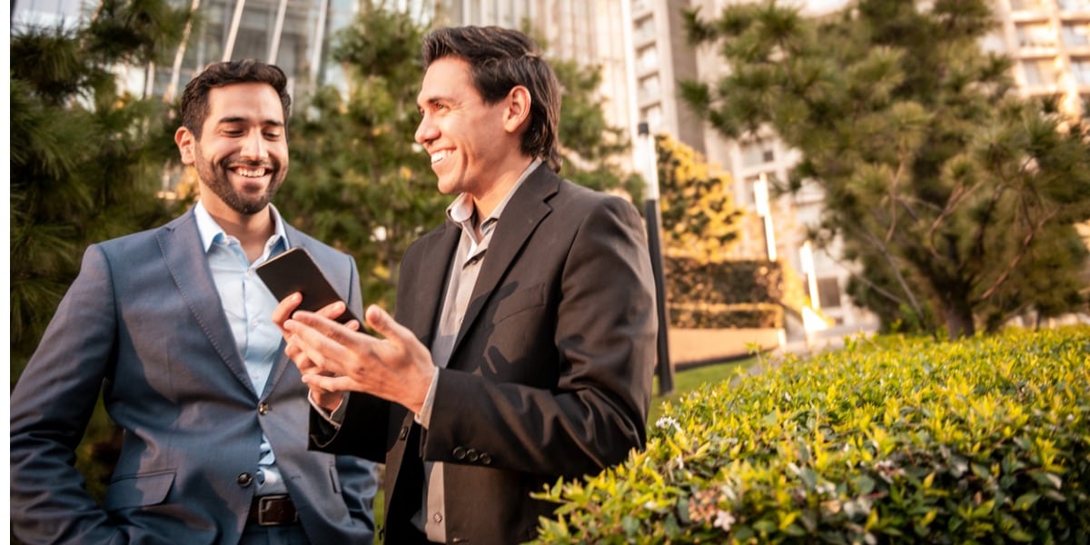 two man with phone