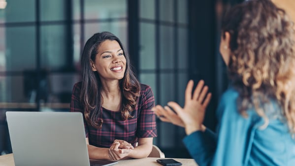 Two women talking