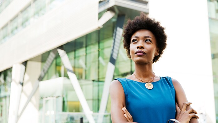 woman standing in front of a building